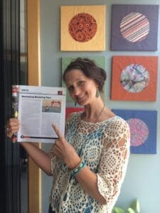 Monica with the published article. 
