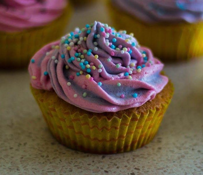 Digital Marketing Strategies - Cupcake with purple icing and sprinkles